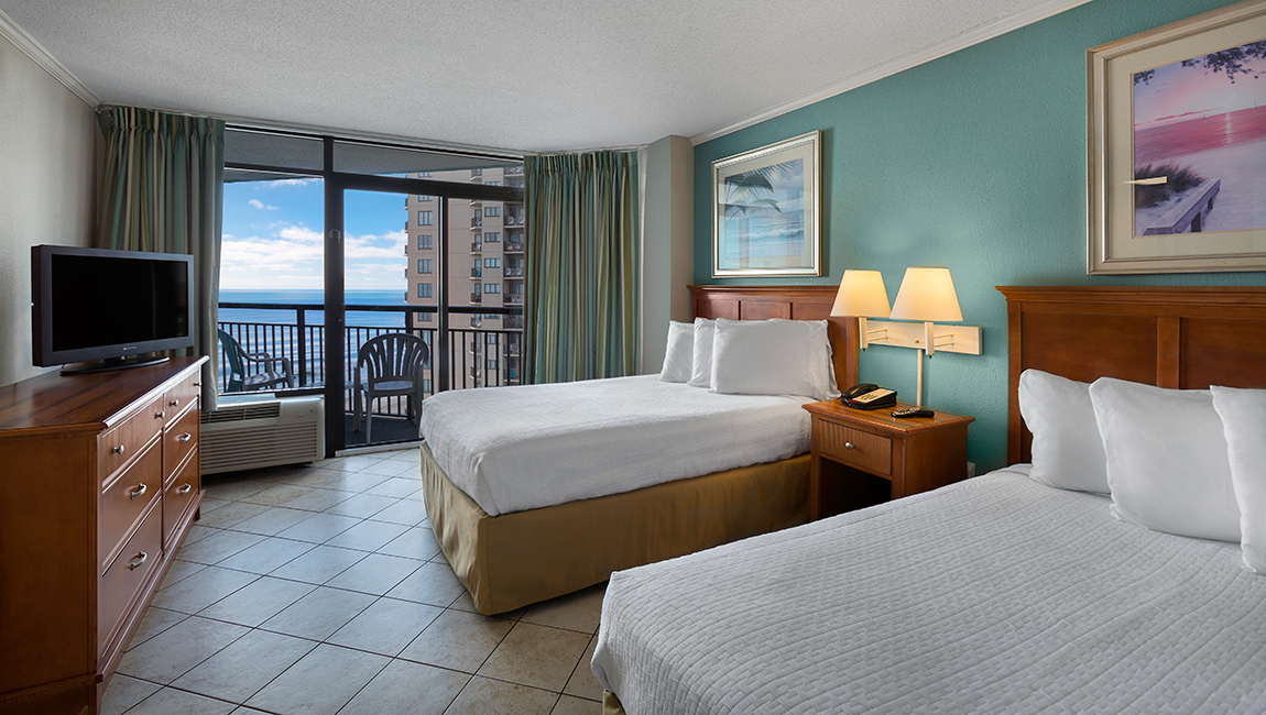 deluxe angle oceanfront suite Myrtle Beach bedroom at landmark resort