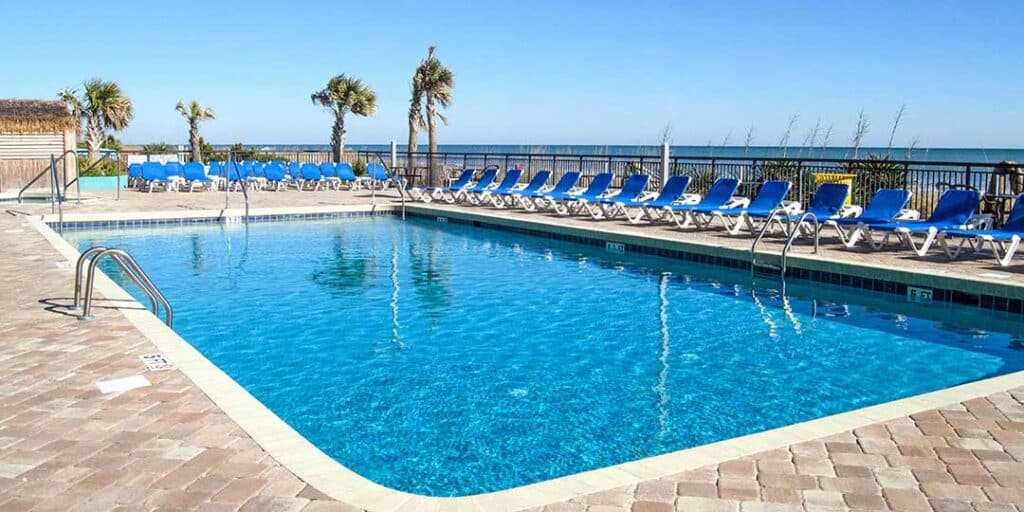 Outdoor pool with chairs