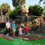 mini golf course with dinosaurs
