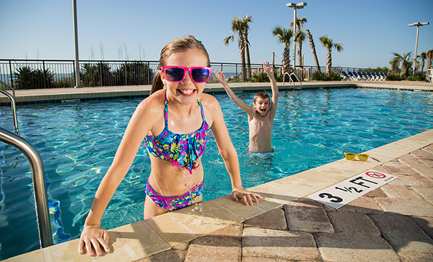 Kids in outdoor pool