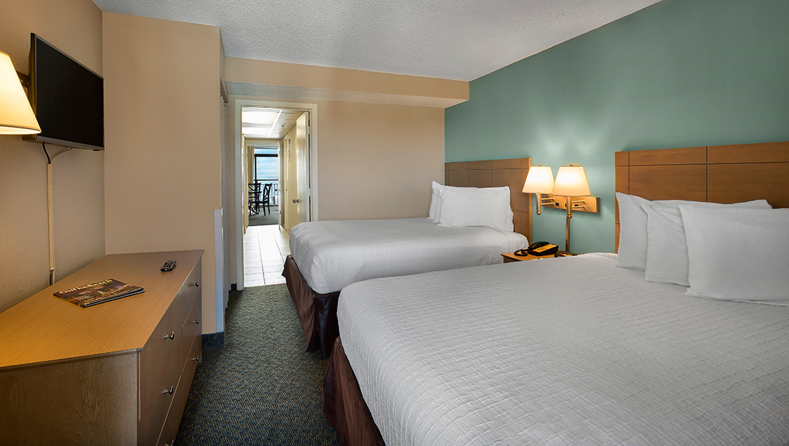 Landmark Resort Deluxe Oceanfront Suite Bedroom